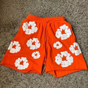 Orange denim tear shorts